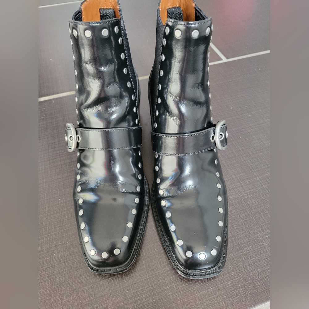 Coach studded black booties.